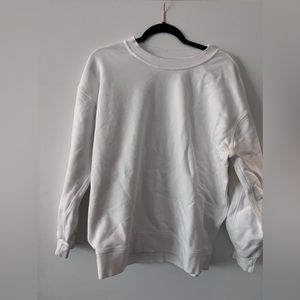 Lulu lemon white perfectly oversized crew. Size 6. Worn few times.